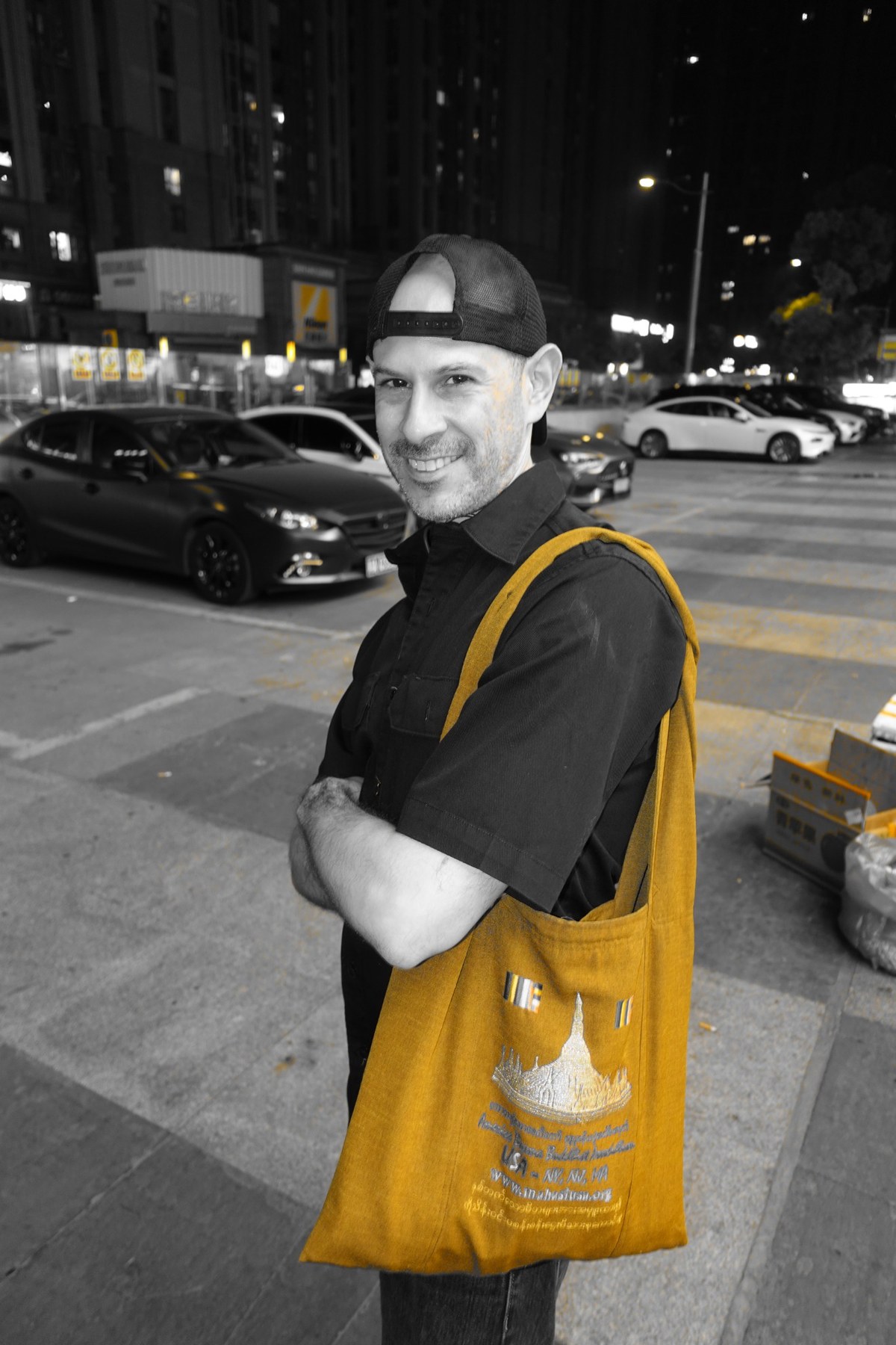 Cory, creator of Amazing Comedy Time, standing outdoors at night in Chengdu